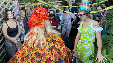 tCostumed attendees in Wild Side West garden